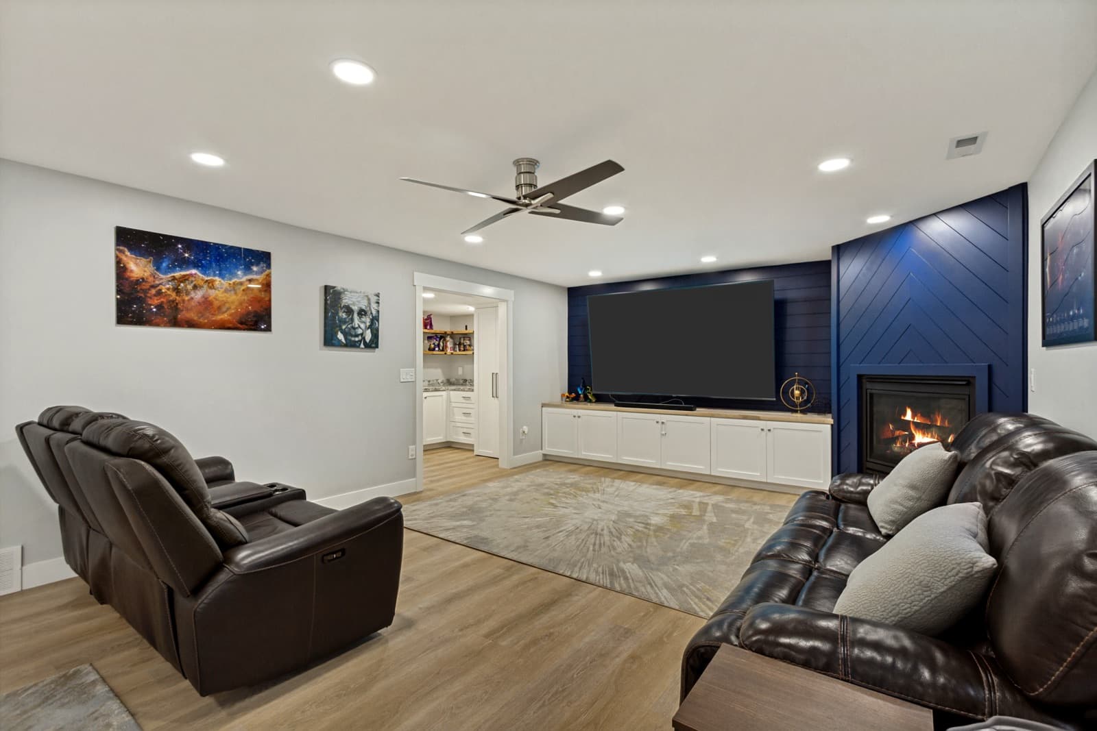 Basement family room from the seating area, looking toward the second kitchen
