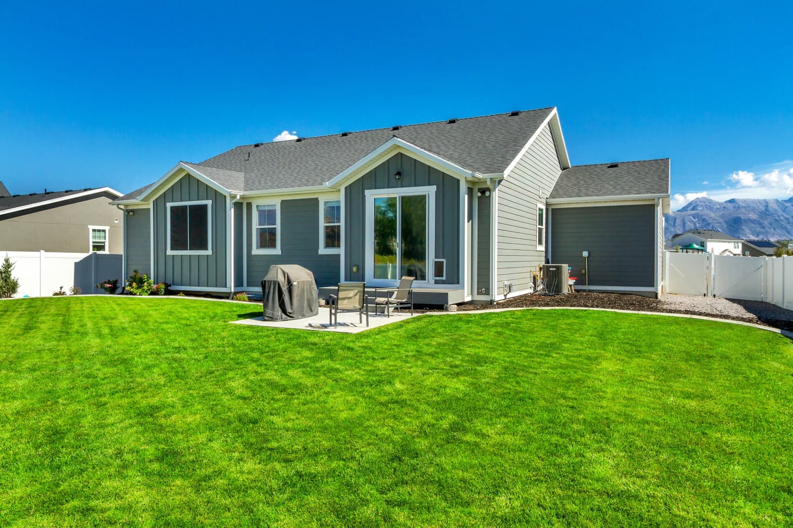 Backyard lawn with mountains in the distance